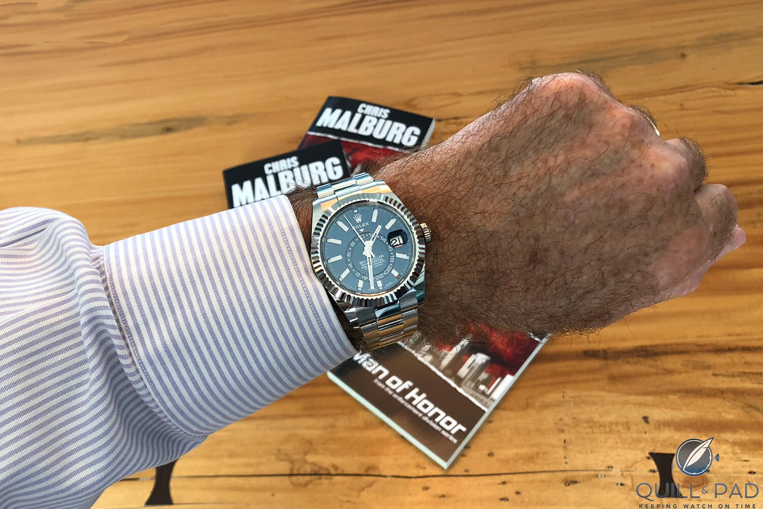 Rolex Sky-Dweller on the author's wrist with second time zone set to his next assignment in Bora Bora