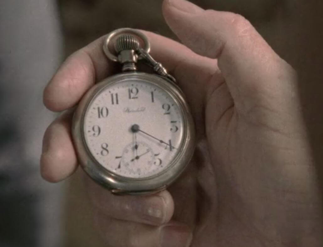 Herschel Greene (Scott Wilson) gives Glenn Rhee (Steven Yeun) his prized pocket watch in 'The Walking Dead'
